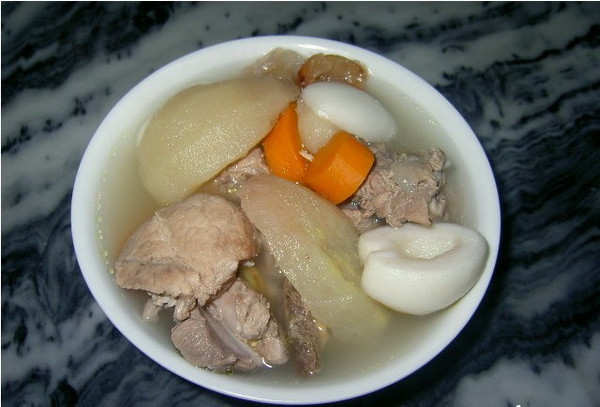 ţ